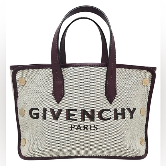 Givenchy Handbags - $5 Starting bid Givenchy canvas and leather tote bag